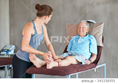 Therapist, legs and elderly man with physical therapy exercise at rehabilitation center. Medical, help and physiotherapist with senior male patient with consultation for muscle injury at clinic. 141158355