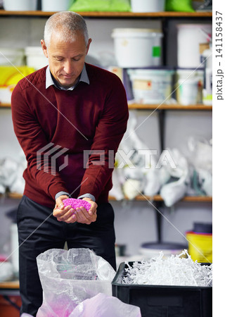 Plastic, factory or mature man with wax, pellet or granules for small business, startup or manufacturing. Warehouse, supply chain or guy person show retail product for recycle, industry or production Plastic, factory or mature man with wax, pellet or granules for small business, startup or manufacturing. Warehouse, supply chain or guy person show retail product for recycle, industry or production 141158437