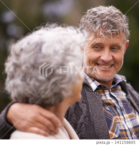 Senior couple, outdoor and smile with hug for retirement with bonding, love and support to relax together. Relationship, romance and happy or fun at park as family, soulmate and commitment 141158605