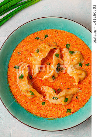 Coconut creamy dumpling soup or curry dumpling soup. Coconut creamy dumpling soup or curry dumpling soup. 141160503