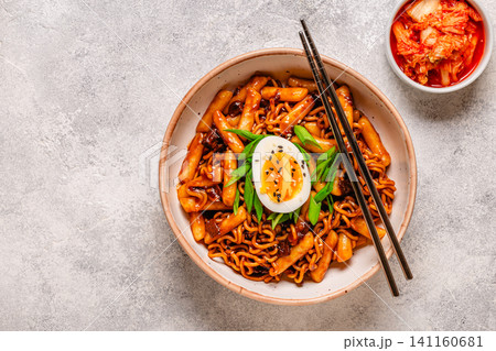 Rapokki - tteokbokki with noodles and chajang sauce Rapokki - tteokbokki with noodles and chajang sauce 141160681