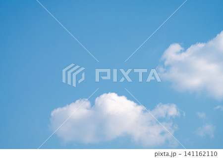 Beautiful blue sky and white cumulus clouds abstract background. Cloudscape background. Blue sky and fluffy white clouds on sunny days. Beautiful blue sky. World Ozone Day. Ozone layer. Summer sky. 141162110
