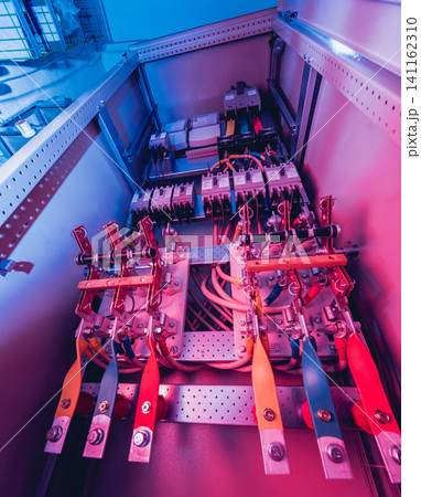 Wires and switches in electric box. Electrical panel with fuses and contactors Wires and switches in electric box. Electrical panel with fuses and contactors 141162310