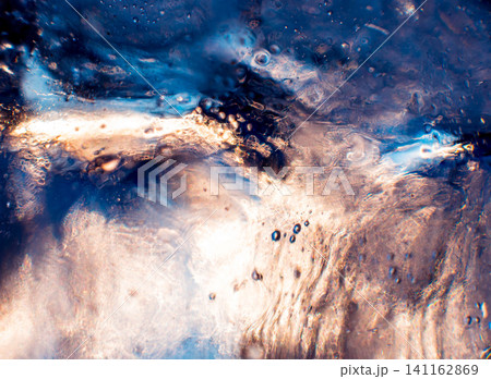 Beautiful abstract background. Ice close-up. The play of light. Beautiful abstract background. Ice close-up. The play of light. 141162869
