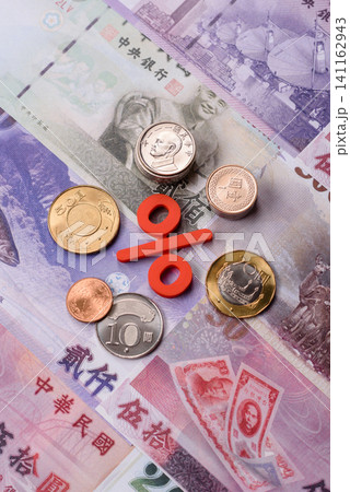 Taiwan, Taiwanese paper banknotes and coins, dollars of various denominations. Taiwanese dollars Taiwan, Taiwanese paper banknotes and coins, dollars of various denominations. Taiwanese dollars 141162943