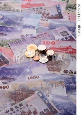 Taiwan, Taiwanese paper banknotes and coins, dollars of various denominations. Taiwanese dollars Taiwan, Taiwanese paper banknotes and coins, dollars of various denominations. Taiwanese dollars 141162978