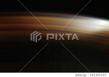blurred and colorful stripe on black background blurred and colorful stripe on black background 141163155