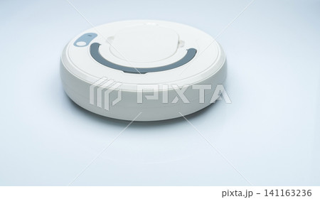 Robot vacuum cleaner isolated on white background. Robot vacuum cleaner for the smart home concept. Cleaning robot for cleaning floor. Wireless device. Smart cleaning technology. Household device. Robot vacuum cleaner isolated on white background. Robot vacuum cleaner for the smart home concept. Cleaning robot for cleaning floor. Wireless device. Smart cleaning technology. Household device. 141163236