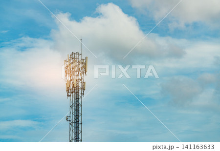 Telecommunication tower with blue sky and clouds. Antenna. Radio and satellite pole. Communication technology. Telecommunication industry. Mobile or telecom 5g network. Telecommunication industry. 141163633