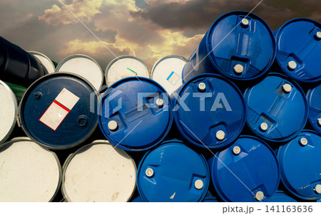 Old chemical barrels. Blue and red oil drum. Steel and plastic oil tank. Toxic waste warehouse. Hazard chemical barrel with warning label. Industrial waste in drum. Hazard waste storage in factory. Old chemical barrels. Blue and red oil drum. Steel and plastic oil tank. Toxic waste warehouse. Hazard chemical barrel with warning label. Industrial waste in drum. Hazard waste storage in factory. 141163636