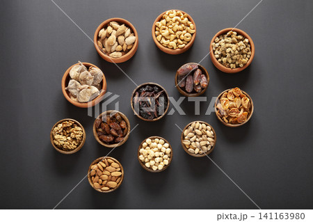 Dried fruits and mixed nuts. Healthy foods. Dried fruits and mixed nuts. Healthy foods. 141163980