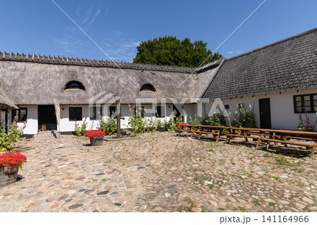 Historic Scandinavian farmhouse courtyard on sunny summer day Historic Scandinavian farmhouse courtyard on sunny summer day 141164966