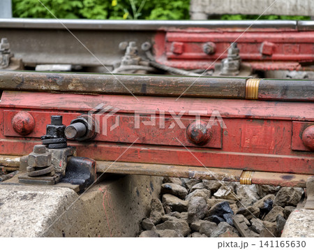 Insulating rail pad ensures railway safety by separating metal components in track joints Insulating rail pad ensures railway safety by separating metal components in track joints 141165630
