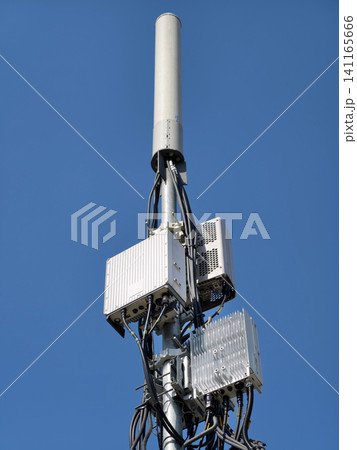 Telecom tower in a rural area with 5G network connection Telecom tower in a rural area with 5G network connection 141165666