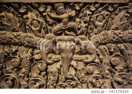Intricate ancient Champa Kingdom sandstone relief featuring Hindu mythological figures and elephants, exhibited at the Museum of Cham Sculpture in Da Nang, Vietnam Intricate ancient Champa Kingdom sandstone relief featuring Hindu mythological figures and elephants, exhibited at the Museum of Cham Sculpture in Da Nang, Vietnam 141170103