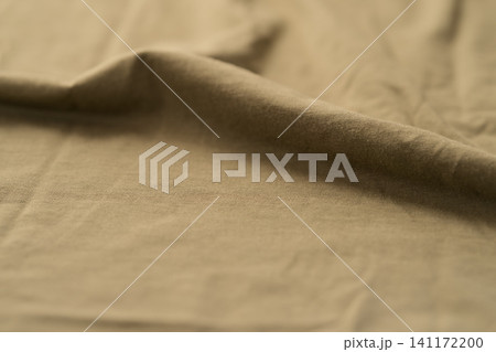 olive color cotton fabric for clothing closeup olive color cotton fabric for clothing closeup 141172200