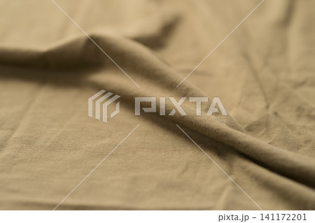 olive color cotton fabric for clothing closeup olive color cotton fabric for clothing closeup 141172201