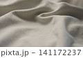 ivory color cotton fabric for clothing closeup 141172237