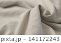 ivory color cotton fabric for clothing closeup 141172243