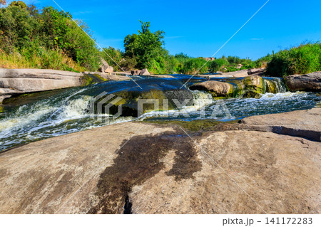 View of Tokovsky waterfalls on the Kamenka river in Dnipropetrovsk region, Ukraine View of Tokovsky waterfalls on the Kamenka river in Dnipropetrovsk region, Ukraine 141172283