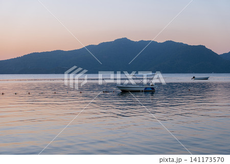 Marmaris Waterfront at Blue Hour with Sea Mountains and Boat 141173570