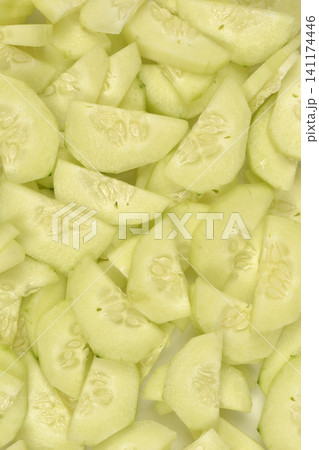 Sliced Peeled Fresh Cucumbers Background Texture Sliced Peeled Fresh Cucumbers Background Texture 141174446