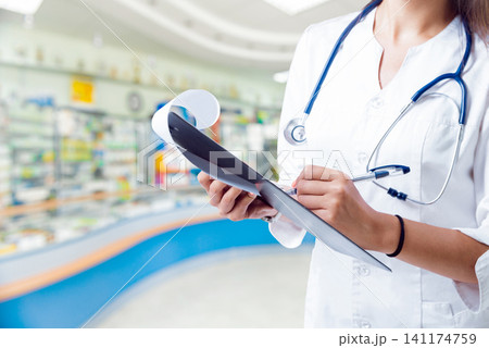 Pharmacist at work Pharmacist at work 141174759