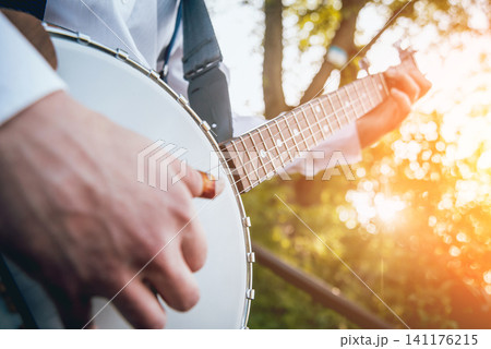 View of musician playing banjo at the street 141176215