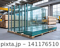 Glass sheets and panels on pallets in factory warehouse 141176510