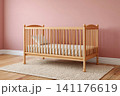 Wooden crib interior in baby girl nursery room 141176619