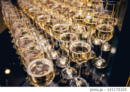 Row of glasses of wine. A restaurant. Row of glasses of wine. A restaurant. 141178105