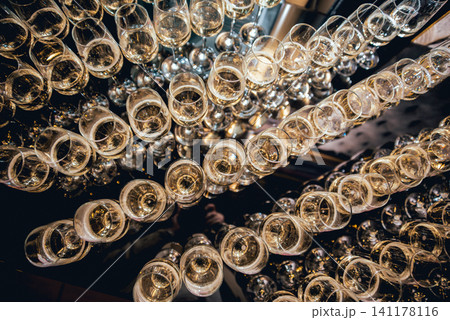 Row of glasses of wine. A restaurant. 141178116