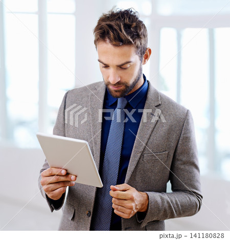 Tablet, read and formal businessman in office, web design and online project or website. Corporate, network and internet for research or planning with male person, strategy and startup workplace Tablet, read and formal businessman in office, web design and online project or website. Corporate, network and internet for research or planning with male person, strategy and startup workplace 141180828