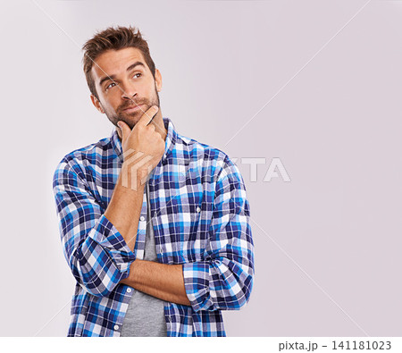Man, thinking and vision idea in studio for future thoughts with brainstorming solution, problem solving or white background. Male person, hand and planning question for decision, wondering or mockup Man, thinking and vision idea in studio for future thoughts with brainstorming solution, problem solving or white background. Male person, hand and planning question for decision, wondering or mockup 141181023