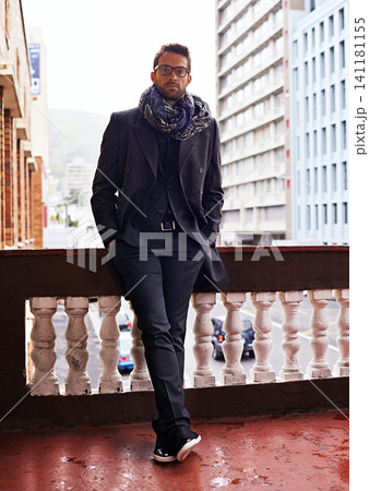Businessman, balcony and fashion for winter outfit or clothes in cold weather with style and confident in London. Portrait, entrepreneur and outdoor in city downtown with office wear and trends Businessman, balcony and fashion for winter outfit or clothes in cold weather with style and confident in London. Portrait, entrepreneur and outdoor in city downtown with office wear and trends 141181155