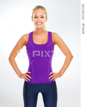 Portrait, woman and exercise with smile in studio, energy and muscle for wellness with health of body. Adult, female person and girl with confidence, happiness and pride for routine and workout Portrait, woman and exercise with smile in studio, energy and muscle for wellness with health of body. Adult, female person and girl with confidence, happiness and pride for routine and workout 141181181