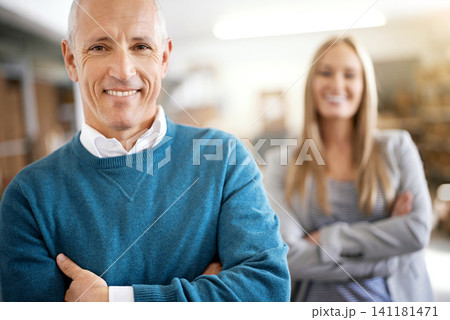 Mature, man and portrait of executive with arms crossed in warehouse for confidence or leadership in logistics industry. .Collaboration, manager and employer with happiness for career and service Mature, man and portrait of executive with arms crossed in warehouse for confidence or leadership in logistics industry. .Collaboration, manager and employer with happiness for career and service 141181471