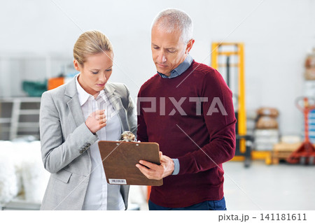 Retail, clipboard or business people in warehouse for cargo checklist, brainstorming or planning delivery logistic. Supply chain, documents or factory team for ecommerce, compliance or stock solution Retail, clipboard or business people in warehouse for cargo checklist, brainstorming or planning delivery logistic. Supply chain, documents or factory team for ecommerce, compliance or stock solution 141181611