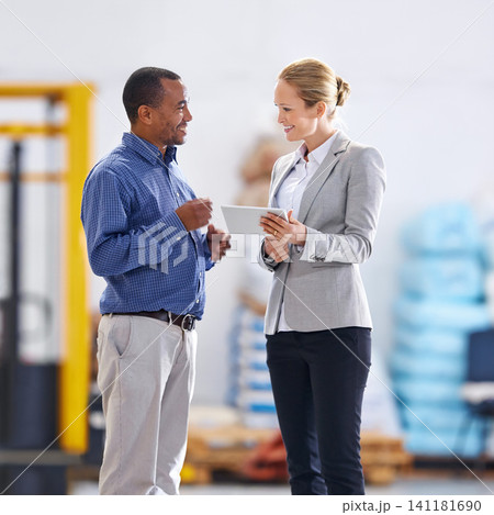 Business people, warehouse and smile with tablet for planning, supply chain and logistics export. Woman, man and digital technology with meeting for teamwork, collaboration and storage in factory Business people, warehouse and smile with tablet for planning, supply chain and logistics export. Woman, man and digital technology with meeting for teamwork, collaboration and storage in factory 141181690