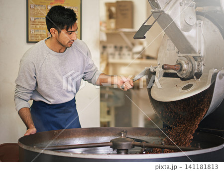 Coffee beans, small business and man with machine for roasting with blending, production and quality control. Entrepreneur, barista or roaster at cafe, sustainable startup shop and espresso process 141181813