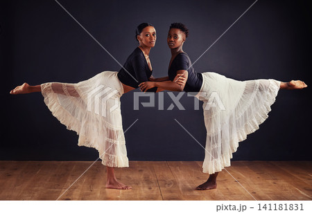 Ballet, studio and portrait of black people for dance routine, balance and performance. Contemporary, dancing and ballerina women for elegant art, movement and collaboration with dark background Ballet, studio and portrait of black people for dance routine, balance and performance. Contemporary, dancing and ballerina women for elegant art, movement and collaboration with dark background 141181831