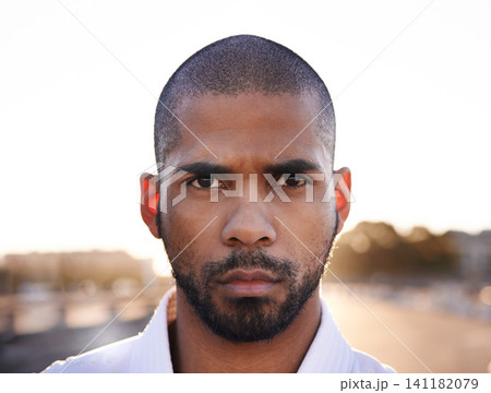 Man, serious and portrait in street for fitness with health, closeup and headshot for training outdoor. Person, athlete and ready for workout, exercise and wellness with sports on metro road in city 141182079