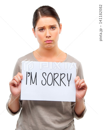 Sad, portrait and woman with Im sorry poster in studio with mistake, fail or regret on white background. Apology, face and female model frown with banner, announcement or broken heart presentation Sad, portrait and woman with Im sorry poster in studio with mistake, fail or regret on white background. Apology, face and female model frown with banner, announcement or broken heart presentation 141182082