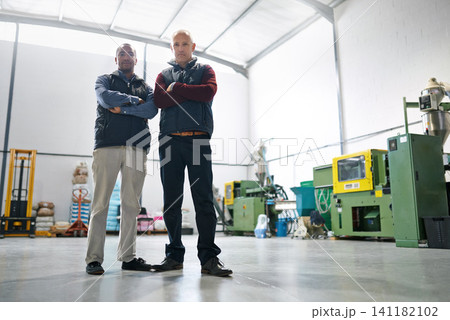 Business, manager and teamwork with arms crossed in warehouse with portrait, confidence and leadership. Collaboration, supervisor and smile with pride for industrial career and distribution factory 141182102