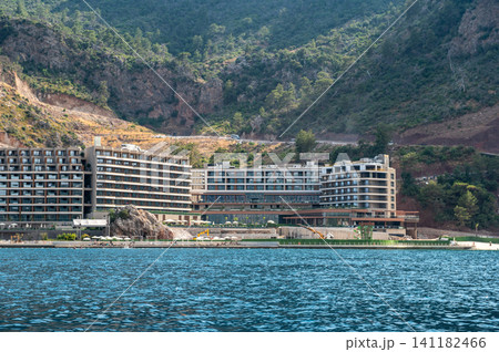 Luxury beach resort with hotels and palm trees in Turkey Luxury beach resort with hotels and palm trees in Turkey 141182466