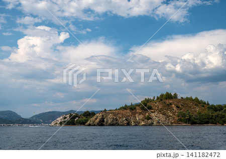 Scenic view of a rocky island coast in Marmaris Turkey Scenic view of a rocky island coast in Marmaris Turkey 141182472