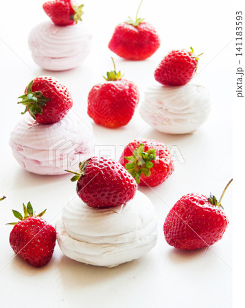 Sweet zephyr dessert with fresh ripe strawberries and vanilla, fresh berries and whipped fruit puree Sweet zephyr dessert with fresh ripe strawberries and vanilla, fresh berries and whipped fruit puree 141183593