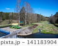 Scenic wooden footbridges over water canals in the hydro-park of Sosnovy Bor sanatorium in Radoshkovichi, Belarus 141183904