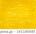 Abstract background with yellow crayon drawing texture. Yellow crayon stroke texture on paper. 141185685