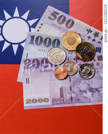 Taiwan, Taiwanese paper banknotes and coins, dollars of various denominations. Taiwanese dollars Taiwan, Taiwanese paper banknotes and coins, dollars of various denominations. Taiwanese dollars 141186028